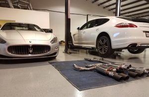 Image with a Maserati and a Porsche and various exhaust pieces